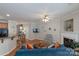 Spacious open living area with fireplace, TV, bar seating, and hardwood floors at 916 Coffee Tree Ln, Rock Hill, SC 29732