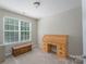 Well-lit office with a roll top desk, ample workspace, and a comfortable bench at 916 Coffee Tree Ln, Rock Hill, SC 29732