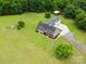 An aerial view of a home on a large lot with pastures and outbuildings at 930 Hawley Rd, McConnells, SC 29726