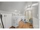 Bathroom featuring a tile shower and hardwood flooring at 930 Hawley Rd, McConnells, SC 29726