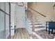Inviting entryway boasts a modern staircase with metal railings and a convenient built-in bench at 930 Hawley Rd, McConnells, SC 29726