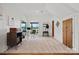 A bright home office features a large window overlooking a lush green field at 930 Hawley Rd, McConnells, SC 29726