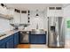 Kitchen featuring stainless steel appliances, white subway tile, and blue cabinets at 930 Hawley Rd, McConnells, SC 29726