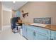 Laundry room featuring blue cabinets, countertops, and a sink at 930 Hawley Rd, McConnells, SC 29726