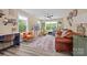 Bright living room with ample natural light from large windows, complemented by stylish decor and furniture at 930 Hawley Rd, McConnells, SC 29726