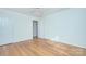 This bedroom features a ceiling fan and hardwood flooring, offering a comfortable space at 101 S Laurel Ave # 72A, Charlotte, NC 28207