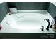 A luxurious white soaking tub with sleek matte black fixtures at 10100 Jack Nicklaus Dr, Lancaster, SC 29720