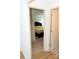 View from doorway of bedroom featuring a dark wood bedframe at 10100 Jack Nicklaus Dr, Lancaster, SC 29720