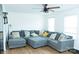 Comfortable living room with a large sectional sofa and ample natural light at 10100 Jack Nicklaus Dr, Lancaster, SC 29720