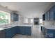Open kitchen with gray cabinets, modern countertops, and an open concept at 1013 Doby Springs Dr, Charlotte, NC 28262