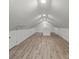 Finished attic with wood laminate flooring and ample natural light at 1015 4Th St, Spencer, NC 28159