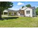 Charming brick home with carport and well-maintained lawn at 1015 4Th St, Spencer, NC 28159