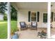 Welcoming front porch with comfortable seating, plants, and a friendly atmosphere at 1016 W 10Th Ave, Gastonia, NC 28052