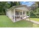 Charming home featuring a cozy front porch with seating and decorative plants at 1016 W 10Th Ave, Gastonia, NC 28052