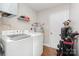 Laundry room includes modern washer and dryer, storage space, and neutral decor at 1016 W 10Th Ave, Gastonia, NC 28052