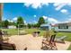 Spacious backyard with a concrete patio, swing, and well-maintained lawn at 1107 Richard Rd, Salisbury, NC 28147