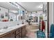 Bright bathroom featuring a soaking tub, double vanity, and decorative mirrors, perfect for relaxation at 1107 Richard Rd, Salisbury, NC 28147