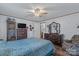 Bedroom featuring hardwood flooring, a ceiling fan, and ample natural light at 1107 Richard Rd, Salisbury, NC 28147