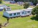 Inviting exterior view showcasing a cozy home with a charming front porch and manicured lawn at 1107 Richard Rd, Salisbury, NC 28147