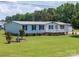 Charming home with a well-manicured lawn and inviting front porch at 1107 Richard Rd, Salisbury, NC 28147