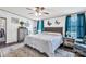 Serene main bedroom boasting a plush bed, soft decor, and natural light, creating a peaceful and restful environment at 1107 Richard Rd, Salisbury, NC 28147