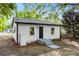 Charming home featuring white siding, a dark front door, and new landscaping for great curb appeal at 1155 Cedar Grove Ln, Rock Hill, SC 29732