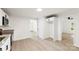 Bright kitchen featuring white cabinets, granite countertops, and stainless steel appliances at 1155 Cedar Grove Ln, Rock Hill, SC 29732