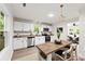 Modern kitchen with white cabinets, stainless steel appliances, and a wooden island at 1155 Cedar Grove Ln, Rock Hill, SC 29732