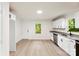 New kitchen with white cabinets, granite countertops, stainless steel appliances and hardwood flooring at 1155 Cedar Grove Ln, Rock Hill, SC 29732