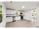 Bright kitchen featuring white cabinets, granite countertops, and stainless steel appliances at 1155 Cedar Grove Ln, Rock Hill, SC 29732