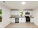 Bright kitchen with white cabinets, granite countertops, stainless steel appliances, and light wood flooring at 1155 Cedar Grove Ln, Rock Hill, SC 29732
