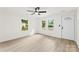 Bright living room with natural light, wood floors, ceiling fan, and neutral paint at 1155 Cedar Grove Ln, Rock Hill, SC 29732