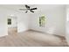 Bright living room with natural light, wood floors, ceiling fan, and neutral paint at 1155 Cedar Grove Ln, Rock Hill, SC 29732