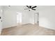 Bright living room with natural light, wood floors, ceiling fan, and neutral paint at 1155 Cedar Grove Ln, Rock Hill, SC 29732