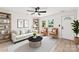 Bright living room featuring a white sofa, two chairs, and neutral walls at 1155 Cedar Grove Ln, Rock Hill, SC 29732