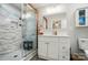 Beautiful bathroom with a marble tiled shower, sleek vanity, and neutral decor at 118 Globe St, Mount Holly, NC 28120