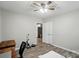 Bedroom with wood floors, ceiling fan and gray walls at 118 Globe St, Mount Holly, NC 28120
