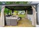 Cozy outdoor patio featuring a gazebo with seating and a fire pit at 118 Globe St, Mount Holly, NC 28120