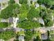 An aerial view of the property displays lush landscaping and neighborhood at 118 Marshdale Sw Ave, Concord, NC 28025