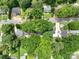 Neighborhood aerial view featuring tree-lined streets and charming homes at 118 Marshdale Sw Ave, Concord, NC 28025