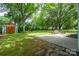Expansive backyard with a shed and patio area, perfect for outdoor living at 118 Marshdale Sw Ave, Concord, NC 28025