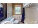 Cozy bathroom includes large mirror and shower/bath at 118 Marshdale Sw Ave, Concord, NC 28025