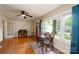 Welcoming living room with hardwood floors, natural light, and open layout, perfect for relaxing and entertaining guests at 118 Marshdale Sw Ave, Concord, NC 28025