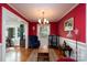 Elegant dining room with ample natural light, comfortable seating, and a sophisticated chandelier, ideal for gatherings at 118 Marshdale Sw Ave, Concord, NC 28025