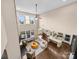 Open floor plan living room featuring high ceilings, hardwood floors, fireplace, and modern decor at 1190 Arges River Dr, Fort Mill, SC 29715