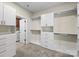 Spacious walk-in closet features custom shelving, drawers, and ample storage for an organized wardrobe and organization at 1190 Arges River Dr, Fort Mill, SC 29715