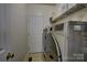 Well-equipped laundry room with modern appliances and ample storage, making laundry chores a breeze at 12125 Mountainside Ln, Charlotte, NC 28278