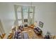 Spacious living room with high ceilings, large windows, and comfortable seating for relaxing or entertaining at 12125 Mountainside Ln, Charlotte, NC 28278