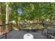 Inviting backyard deck with seating and views of the surrounding lush greenery and neighborhood at 12602 Angel Oak Dr, Huntersville, NC 28078