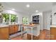 Well-lit kitchen featuring a butcher block island and ample counter space at 12602 Angel Oak Dr, Huntersville, NC 28078